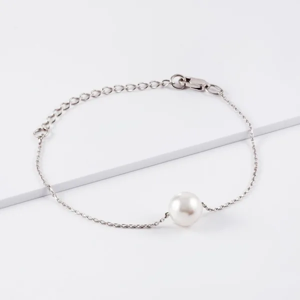 Браслет из серебра с жемчугом кристаллами Swarovski — арт. 000-370269